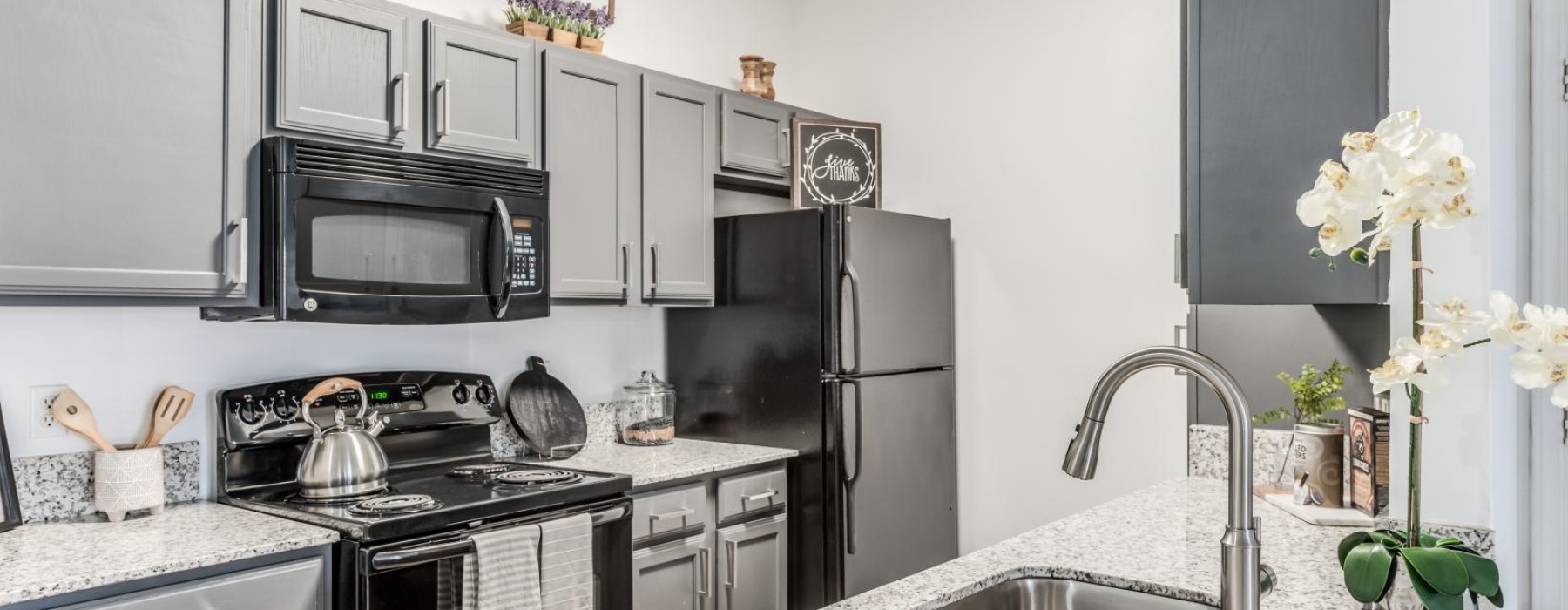 a kitchen with stainless steel appliances
