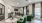 a clubhouse room with green chairs