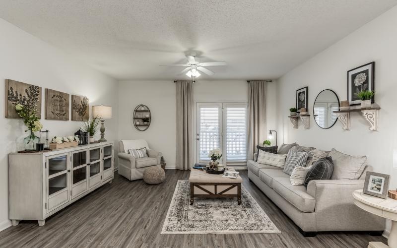 a living room with a couch and a table